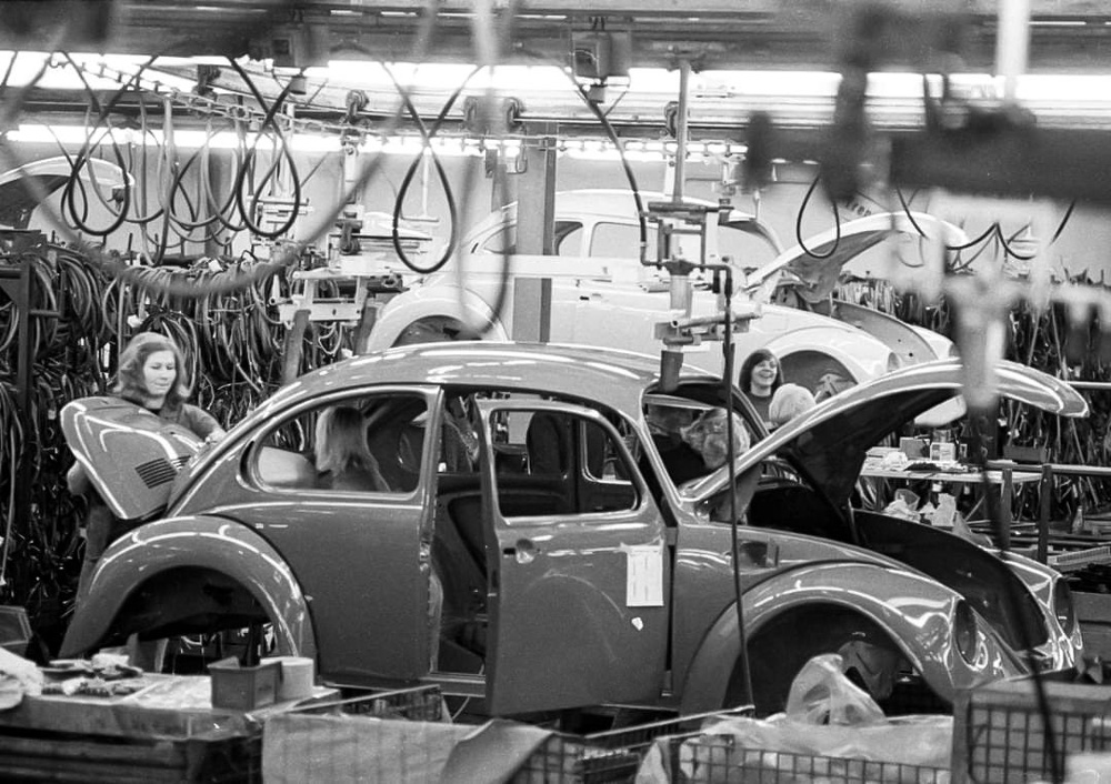 Look 
        how happy the workers look while building the Beetle