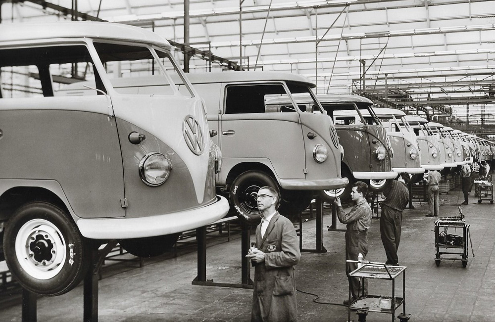 A Volkswagen Inspector checks a Type 2 Transporter in the final assembly hall in 1962