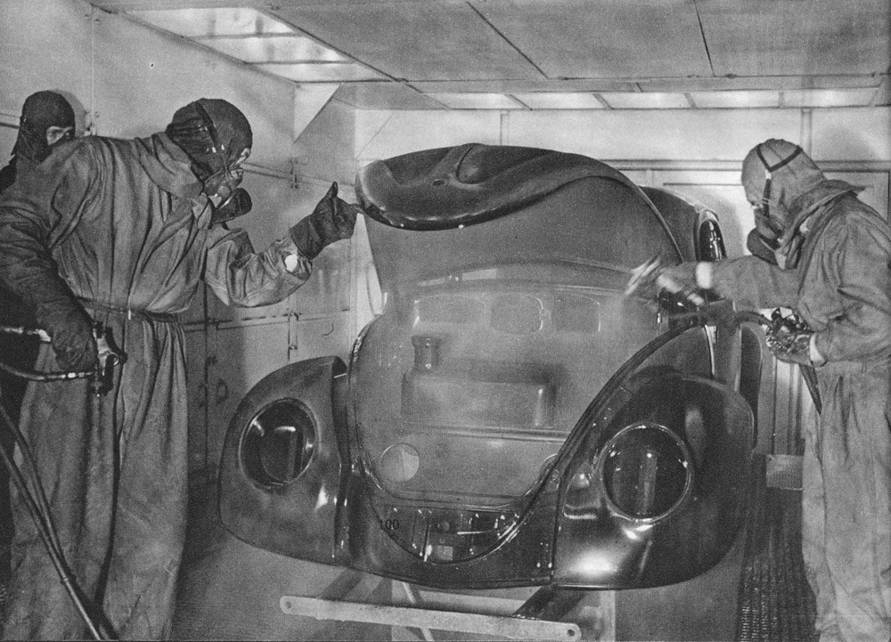 Spray painting the body by hand at the Wolfsburg factory in 1949