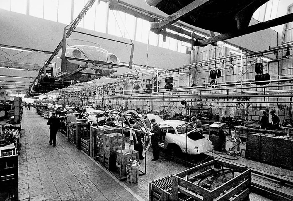 Beetle Cabriolet bodies are passing over the assembly line of notchback Porsche 356s at the Karmann factory in Osnabr&uuml;ck, Germany