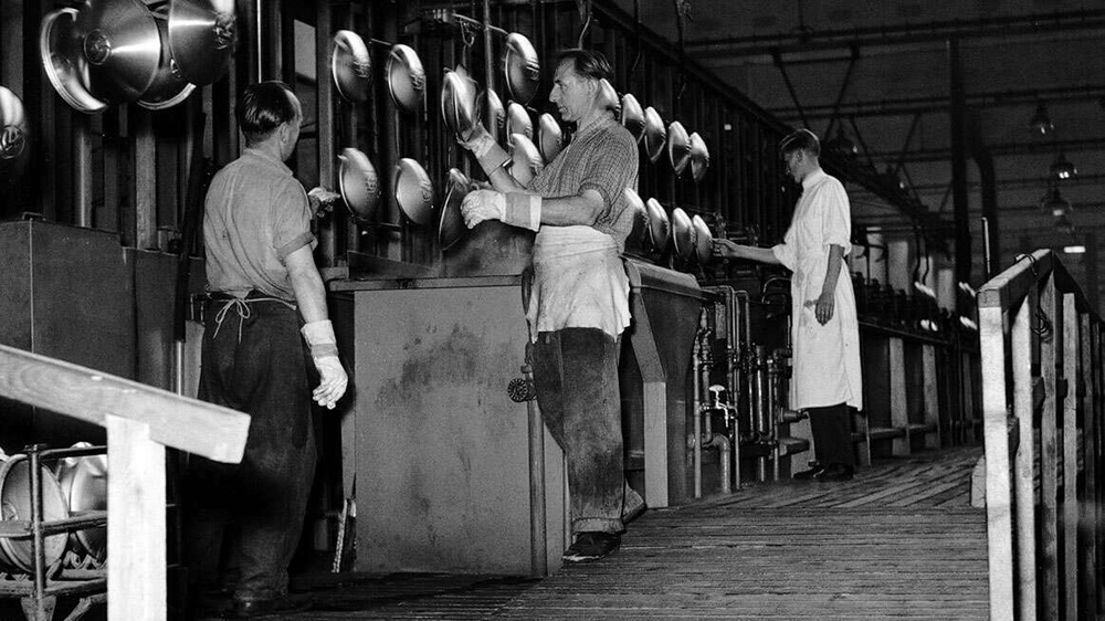 Hubcap manufacturing in Wolfsburg, dated 1956. VW made around 1,5 million hubcaps this year alone