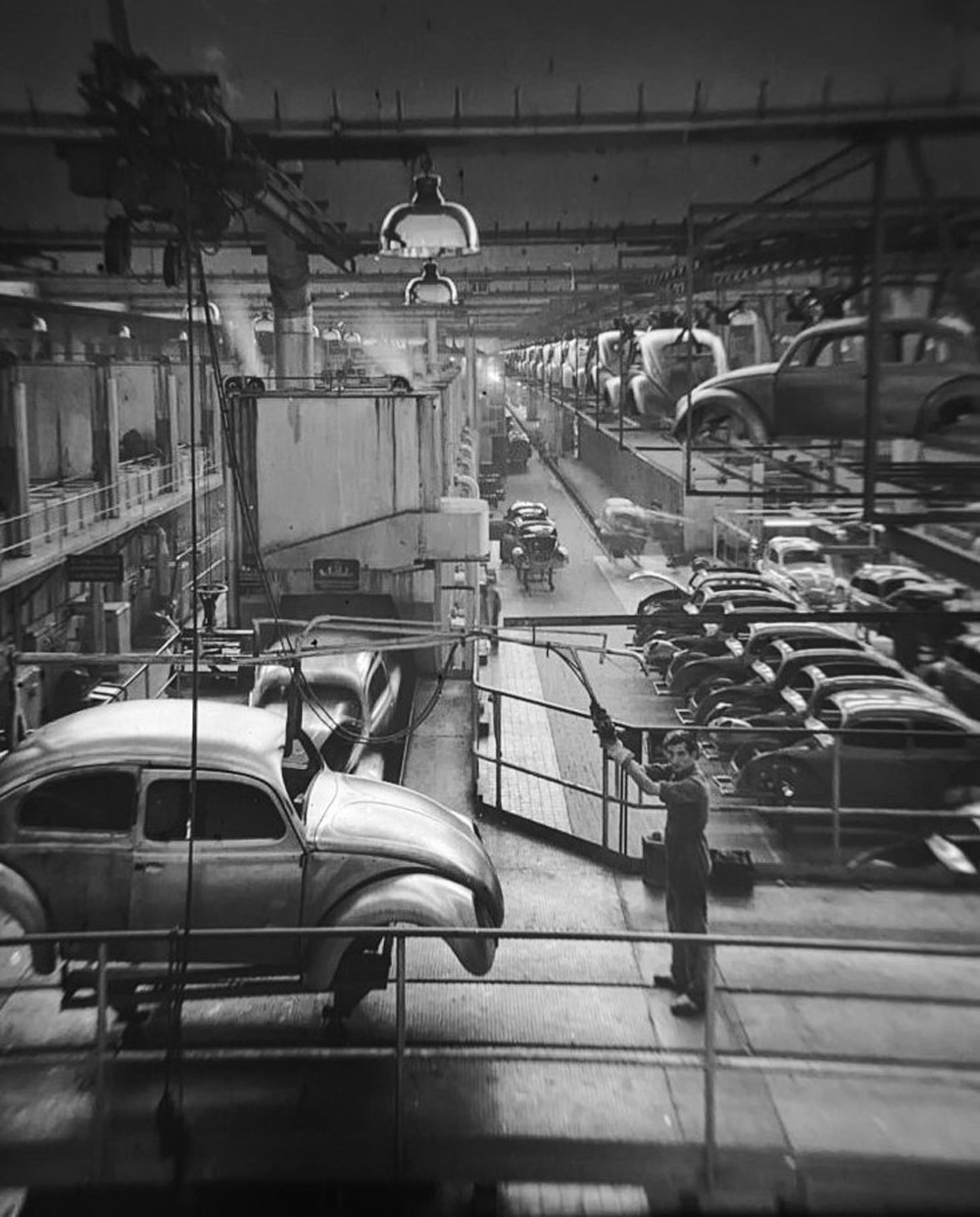 Bodies-in-white 
        move through a hall at Volkswagenwerk Wolfsburg