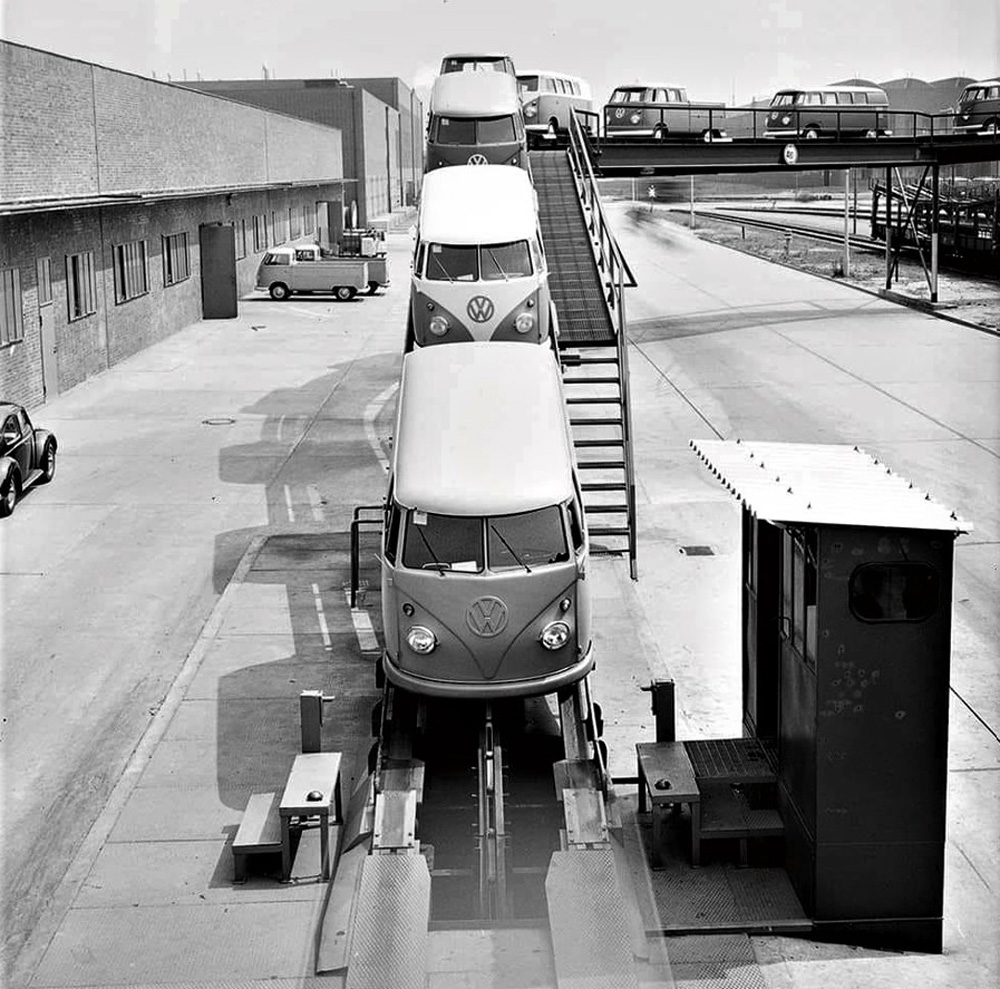 Driverless 
        Transporters move slowly and silently down the long automated conveyor