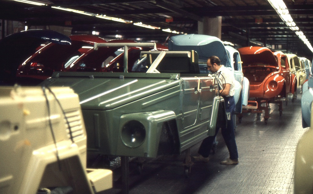 A freshly painted green Volkswagen Type 181 on the line