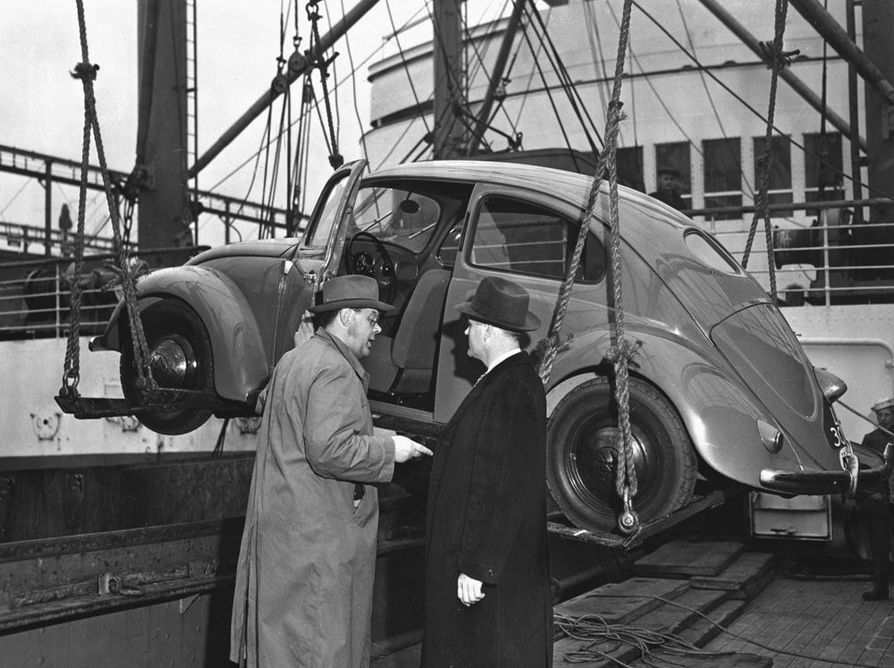 The 
        Netherlands first Volkswagen importer Ben Pon loaded a Beetle aboard